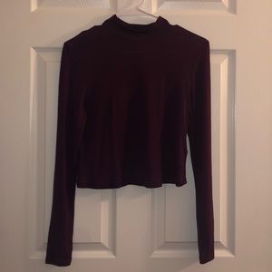 Dark maroon mock neck top